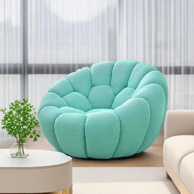Bloom in Comfort – Pumpkin Puff Swivel Lounge Chair